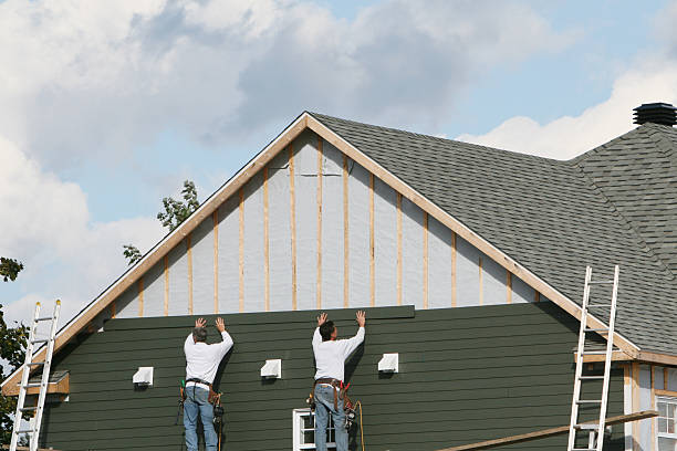 Professional Siding Installation technician working in Saint Stephens Church, VA